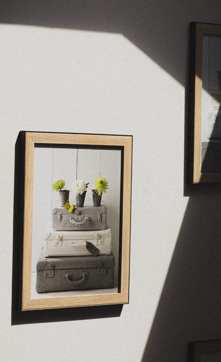 Framed photographs on a wall